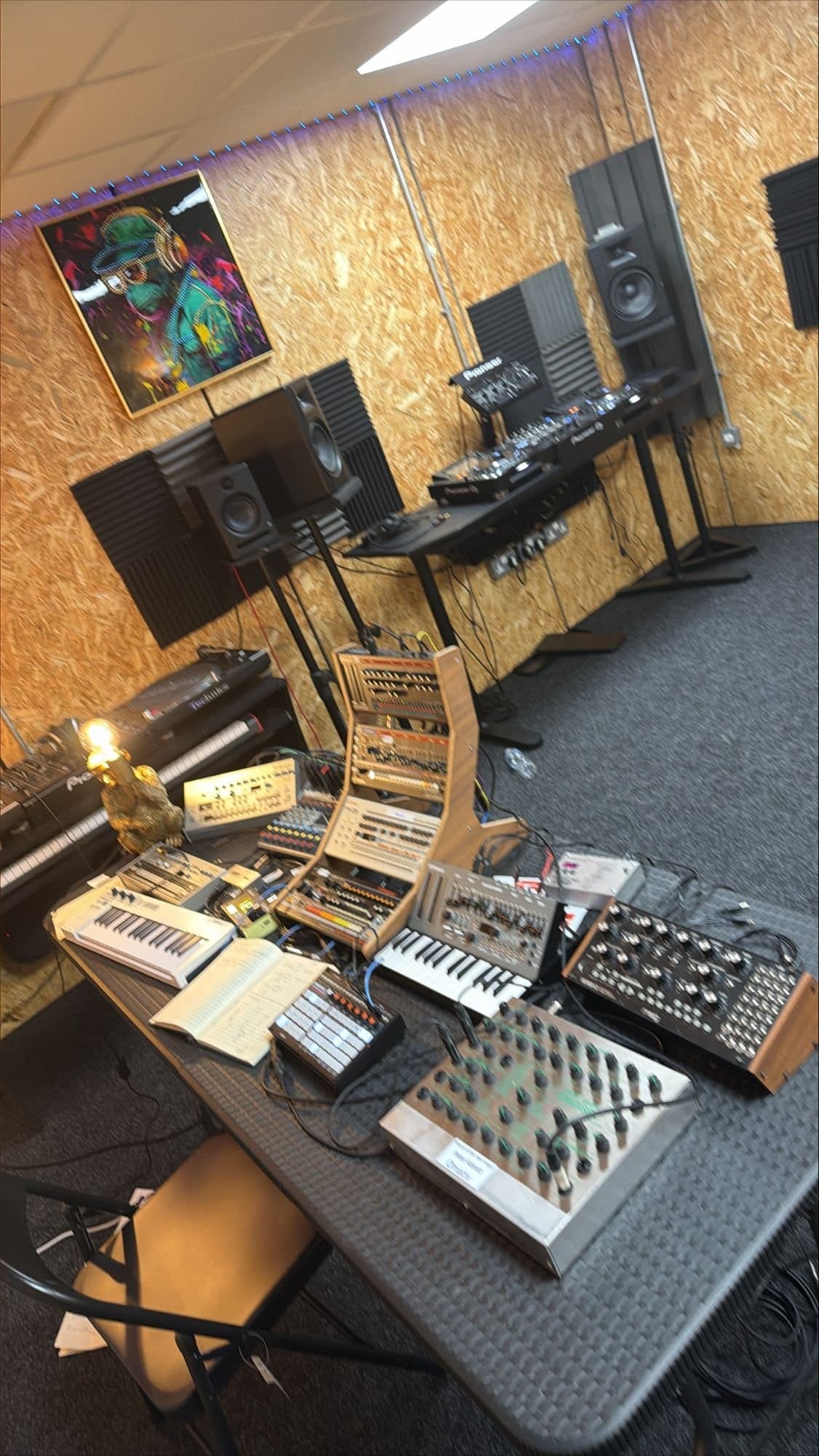 The synth corner of the new unit, with the DJ decks and monitors along the back wall